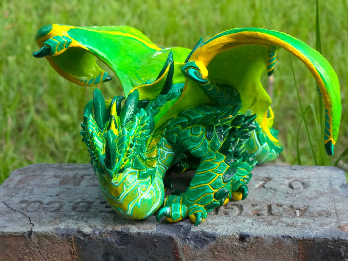 grimxing's tweet photo. An emerald dragon 🐲 forged in polymer clay https://t.co/UkbUQfIaXJ
