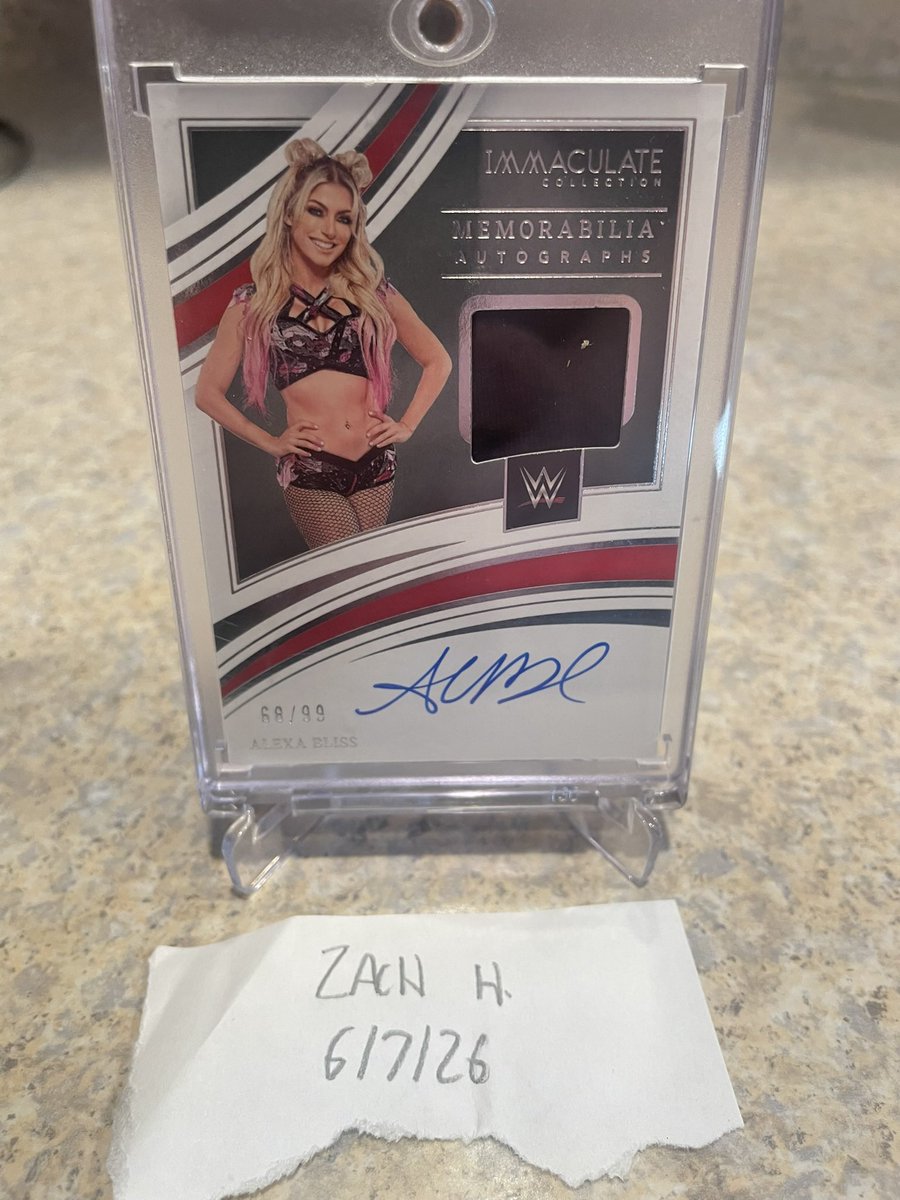 HuffCards's tweet photo. $135 shipped. 
Alexa Bliss Immac /99 https://t.co/RUBmWim5r8