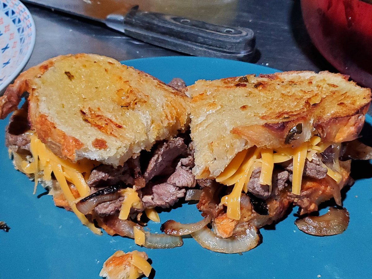 HandyGingerGal's tweet photo. Cheesesteak sandwiches on cheddar jalapeño bread. I put a dollup of my mango pineapple chutney on the side, for spice 😁 https://t.co/PEE2CcqxY8