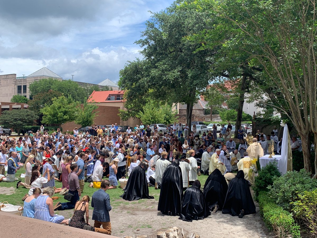ChasCathedral's tweet photo. Led by Bishop Jacques Fabre-Jeune, members of our parish and community celebrated the Feast of Corpus Christi today. The procession through the streets of downtown Charleston proclaimed the real presence in the Holy Eucharist. #Jesus #Eucharist #Catholic #Charleston https://t.co/DBs0lQTcZG