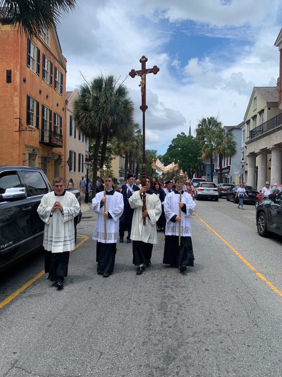 ChasCathedral's tweet photo. Led by Bishop Jacques Fabre-Jeune, members of our parish and community celebrated the Feast of Corpus Christi today. The procession through the streets of downtown Charleston proclaimed the real presence in the Holy Eucharist. #Jesus #Eucharist #Catholic #Charleston https://t.co/DBs0lQTcZG