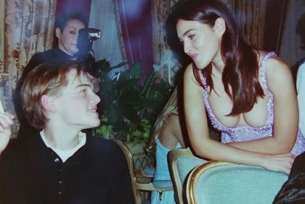 historigins's tweet photo. Leonardo DiCaprio with Monica Bellucci at a Versace after party in Paris, 1995 https://t.co/V25mt8eD8p