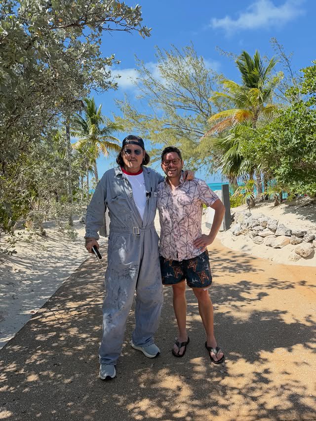 JerrieDepp's tweet photo. New photos of God Dad (#JohnnyDepp) and Tiger_Ranch on JD’s island 😎

Island vibes, but that outfit in the sun is wild 🤣🔥 Makes you wonder if he’s built different or just always in his own weather system 😂

(Repost &amp; credits to Tiger_Ranch’s IG) https://t.co/09ExWg6hJe