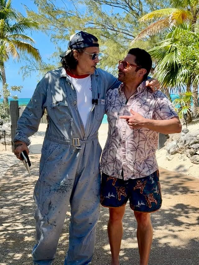 JerrieDepp's tweet photo. New photos of God Dad (#JohnnyDepp) and Tiger_Ranch on JD’s island 😎

Island vibes, but that outfit in the sun is wild 🤣🔥 Makes you wonder if he’s built different or just always in his own weather system 😂

(Repost &amp; credits to Tiger_Ranch’s IG) https://t.co/09ExWg6hJe