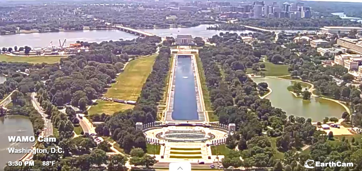 AwakenedOutlaw's tweet photo. The number of people losing their minds over a reflecting pool is something to behold.

You can clearly see that its color is American-flag blue from this angle from a Live Cam fixed to the top of the Washington Monument.  Now compare it with the green water in the pond to the right.  That was the same color the reflecting pool was before it was fixed. 

Oh, and wind causes ripples in water that impact reflection.  For those slow on the uptake, this crazy phenomenon applies to all water everywhere.  😁  

I'm not sure why that's difficult to understand, but it seems to be.

When it's done filling in a day or so, and the weather isn't impeding the reflection, it will be beautiful.  And all the dummies foaming at the mouth over it will look even dumber than they do now.