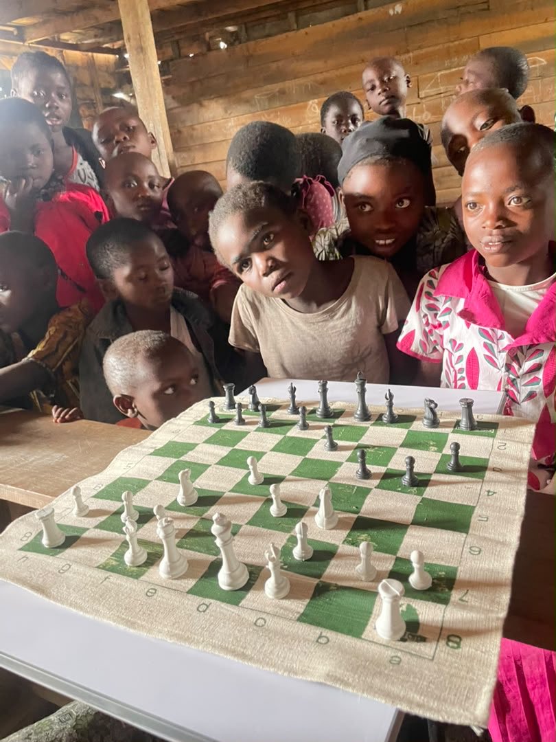 thegiftofchess's tweet photo. In the heart of Goma, DRC children are learning the game of chess on custom made @thegiftofchess chess sets manufactured by @SogaChess from waste plastic. This is education, jobs, &amp; environment. More importantly this is an expression of love, creating hope &amp; opportunity. https://t.co/ZCib3e0hQN