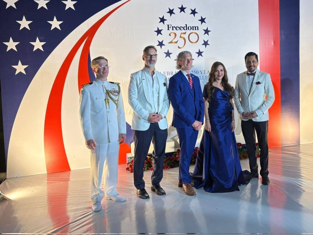 FaisalZahidPO's tweet photo. A memorable click with H.E. Natalie A. Baker, Chargé d’Affaires . 🇺🇸

Captured during the grand celebration of the 250th National Day of the United States at the U.S. embassy.  

#USA250 #AmericanIndependenceDay #hollywood #USEmbassy  #PakUSRelations #Diplomacy #IslamabadEvents https://t.co/lGPWGqStll