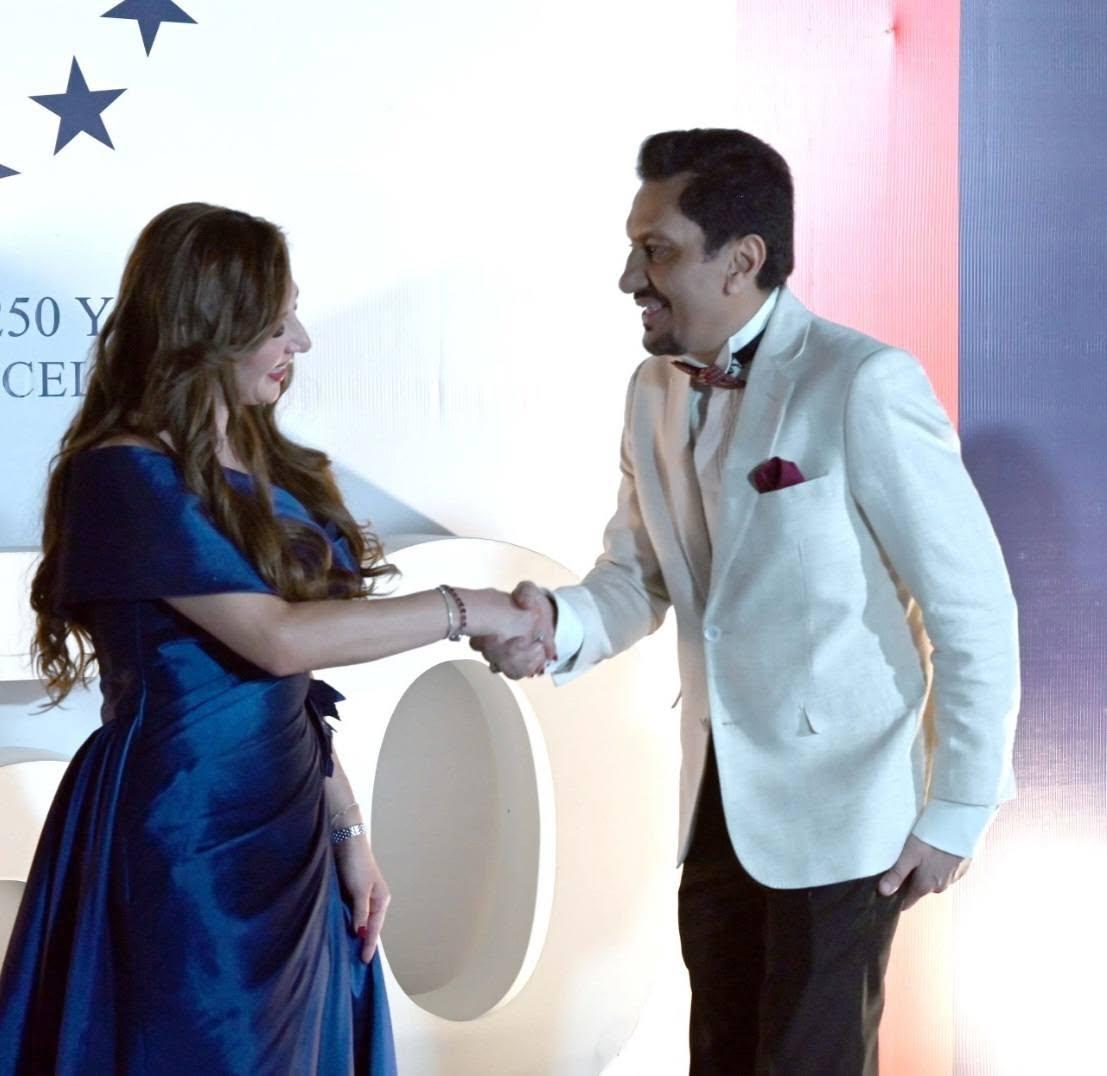 FaisalZahidPO's tweet photo. A memorable click with H.E. Natalie A. Baker, Chargé d’Affaires . 🇺🇸

Captured during the grand celebration of the 250th National Day of the United States at the U.S. embassy.  

#USA250 #AmericanIndependenceDay #hollywood #USEmbassy  #PakUSRelations #Diplomacy #IslamabadEvents https://t.co/lGPWGqStll