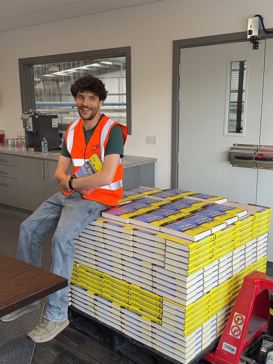 dailycolinmorg's tweet photo. colin morgan looks sooo happy and cute with a huge pile of his debut novel 🥹🥹 https://t.co/M3NjlPzam2