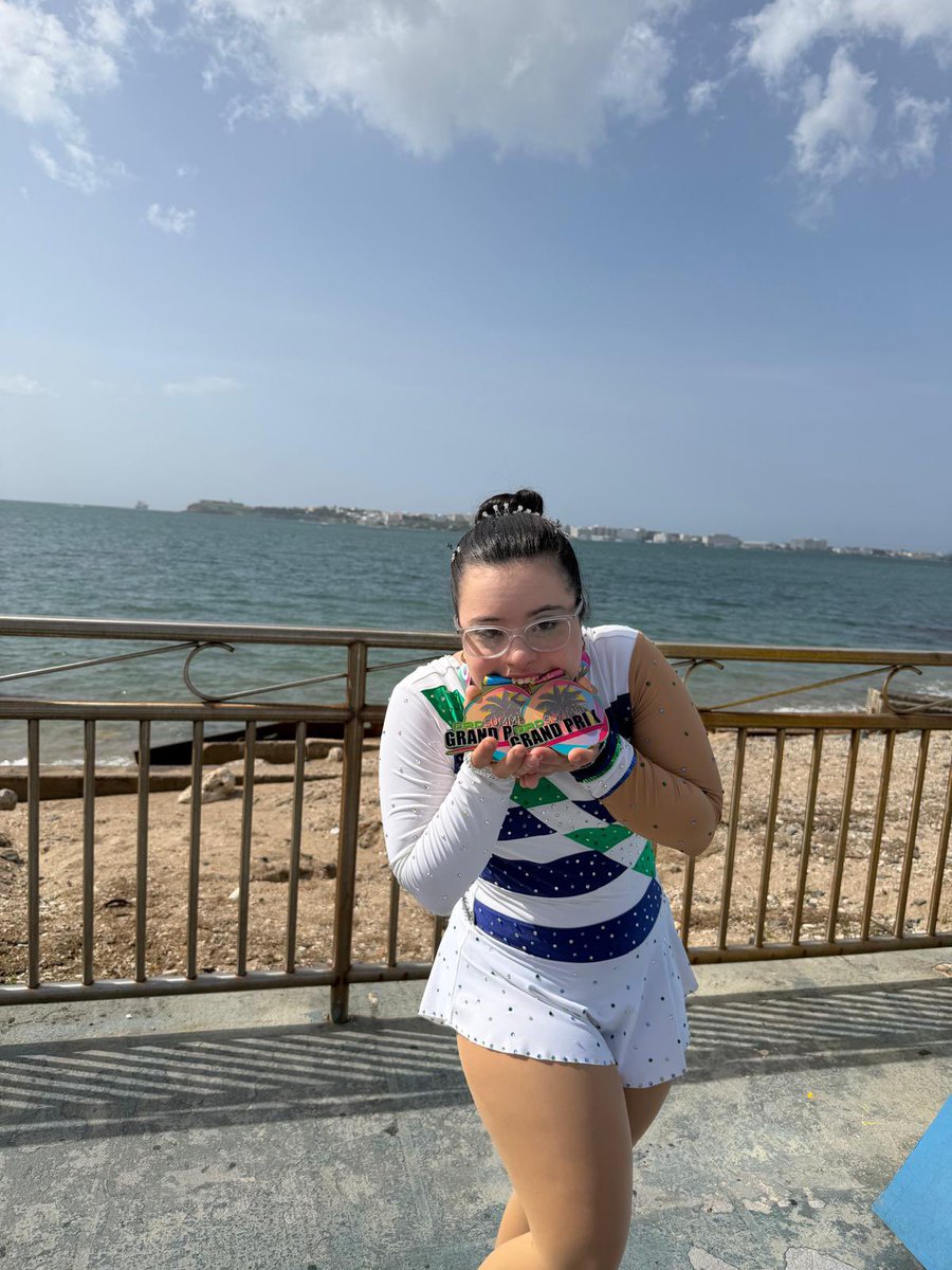 catano's tweet photo. Felicitamos a nuestra atleta Nohely Pérez por su extraordinaria participación en el Summer Grand Prix 2026, donde conquistó doble medalla de oro 🥇🥇 en las categorías de implemento de cuerda y cinta. 🤸🏼‍♀️ https://t.co/Iy2Qd0rwU9