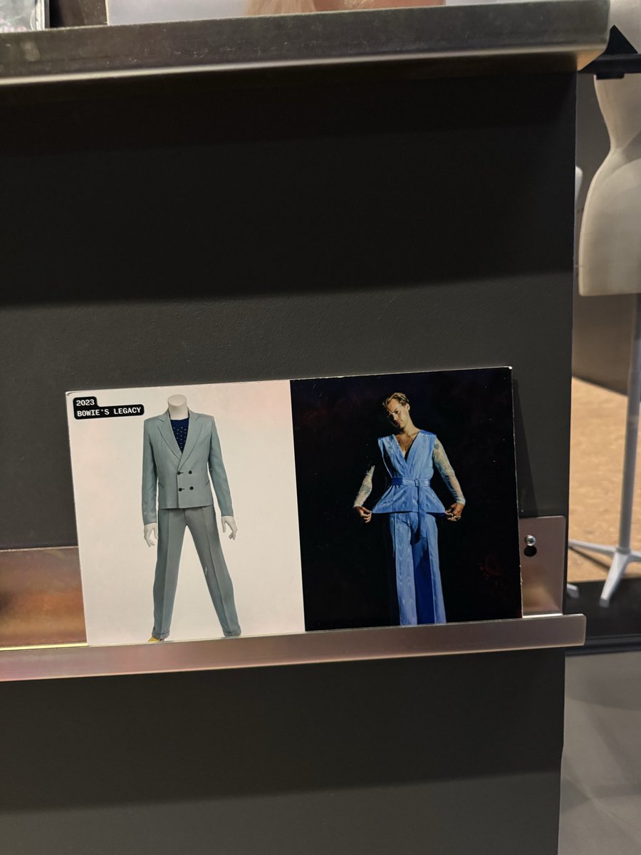 HS_News_2's tweet photo. Harry is included in the 'Library of Connections' section at London's David Bowie Centre, via a photo from Lights Up music video set that represents Bowie’s legacy https://t.co/q0A7uCRyqB