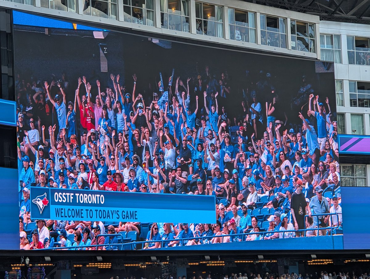 MarkOSSTF's tweet photo. One of the most fun assignments for my job is organizing social events. 

Today was an awesome day at the ballpark with 200+ @OSSTFtoronto Teachers' Bargaining Unit Members and their families/friends watching the @BlueJays defeat the Orioles 6-4!

And we were on the Jumbotron! https://t.co/UXNRo3SNvm