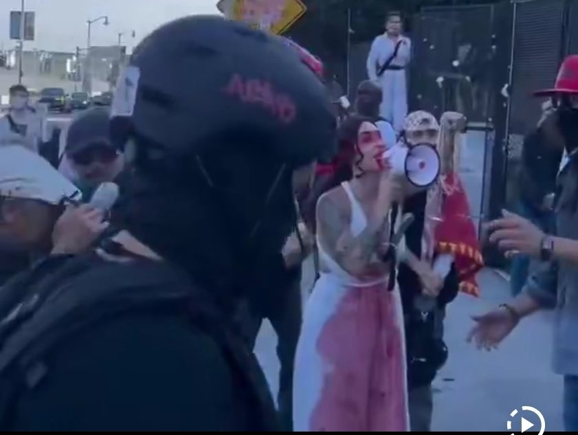 MaryEBarrentine's tweet photo. @MrAndyNgo Maybe someone saw this guy with the megaphone and a tattoo on his right forearm in a context to be able to identify him. https://t.co/2ixnoEENgk