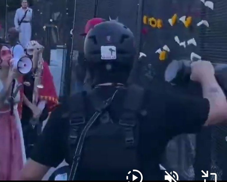 MaryEBarrentine's tweet photo. @MrAndyNgo Maybe someone saw this guy with the megaphone and a tattoo on his right forearm in a context to be able to identify him. https://t.co/2ixnoEENgk