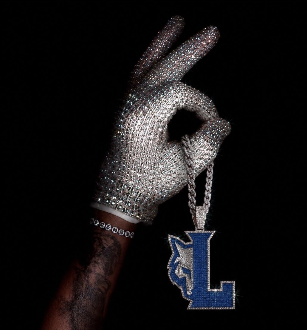 LehmanLobosFB's tweet photo. @coachwharris bringing the bling. https://t.co/bxuFhbMrxE
