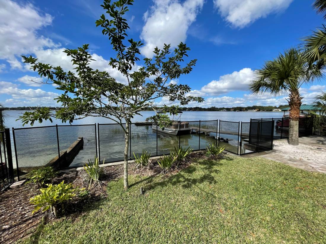 BabyBarrier's tweet photo. One of our custom pool safety fence installations to prevent young children from accessing the lake water. #RemovablePoolFence #PoolSafety 
https://t.co/gmZemPvrfi https://t.co/QR3lUi0kdI