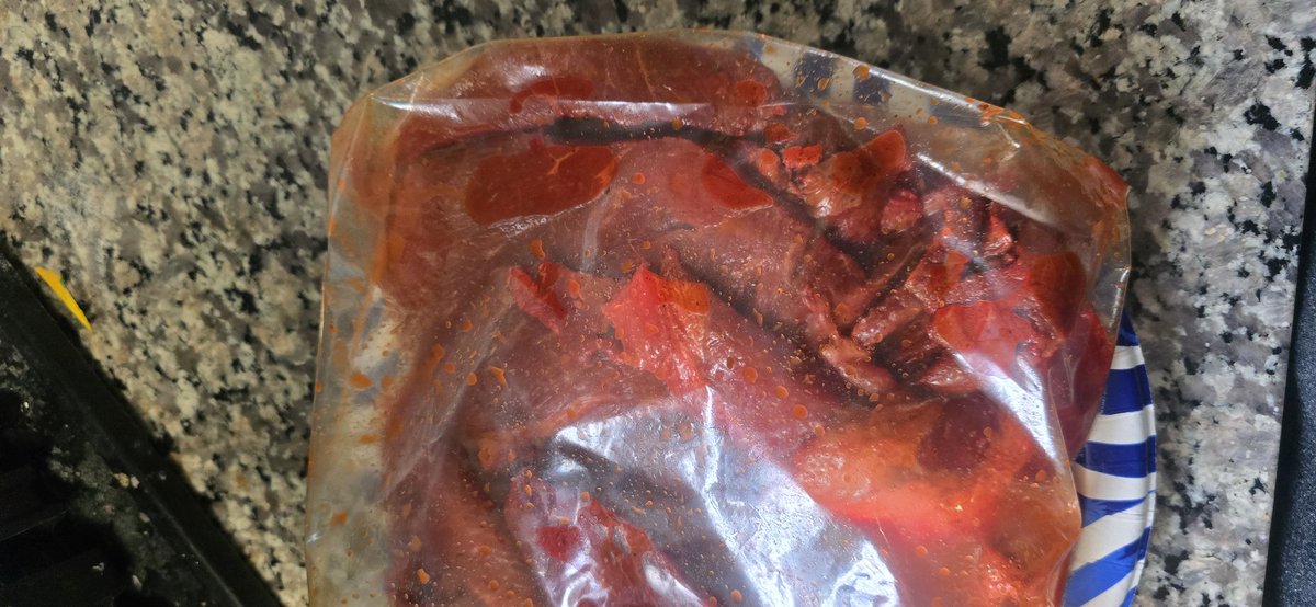 JoshKin04734969's tweet photo. Perfectly sliced, nice color from 24 hour marinade,  just letting it rest on counter to get to room temp before grilling https://t.co/iJ2XgZBL8f