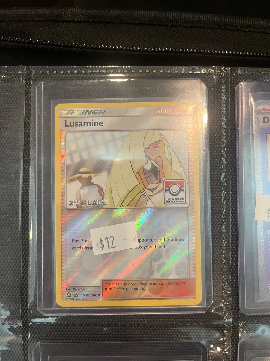 glitchy_potat's tweet photo. Found this at a card show I went to and it’s frying me. Like hey congrats on fumbling finals at the local, so here’s an artist rendition of Lusamine realizing that she’s never getting her husband back! https://t.co/BJJi4kOF4Z