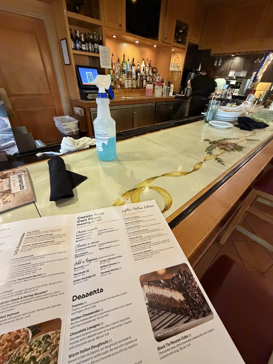jackjenness's tweet photo. .@olivegarden  I was about to be treated to Olive Garden for the first time ever, but was left speechless. Nobody at the bar, yet piles of dishes and trash all over it. The bartender put our silverware down without clearing or wiping anything. Disgusted and disappointed. https://t.co/ahB6ikhnAV