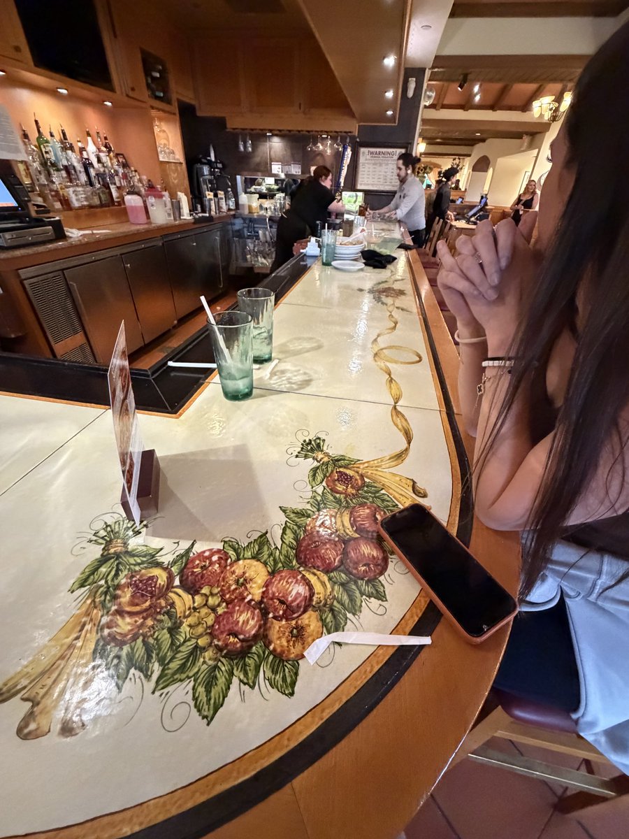 jackjenness's tweet photo. .@olivegarden  I was about to be treated to Olive Garden for the first time ever, but was left speechless. Nobody at the bar, yet piles of dishes and trash all over it. The bartender put our silverware down without clearing or wiping anything. Disgusted and disappointed. https://t.co/ahB6ikhnAV