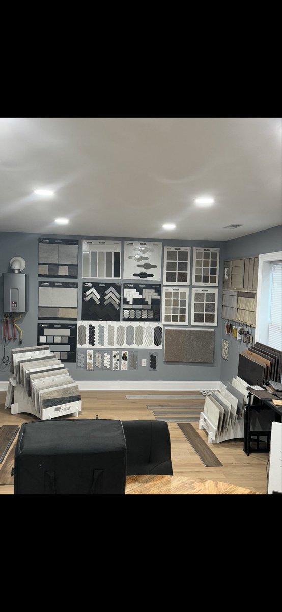 Tinyv73's tweet photo. @Coco_8_32 Typed it. 
I have a “showroom” that displays my tile and cabinets for people to pick and choose. My current display is just doors on a wall as you can see my tile is on point. Cabinets not so much 😂 https://t.co/NZbC5LynKa