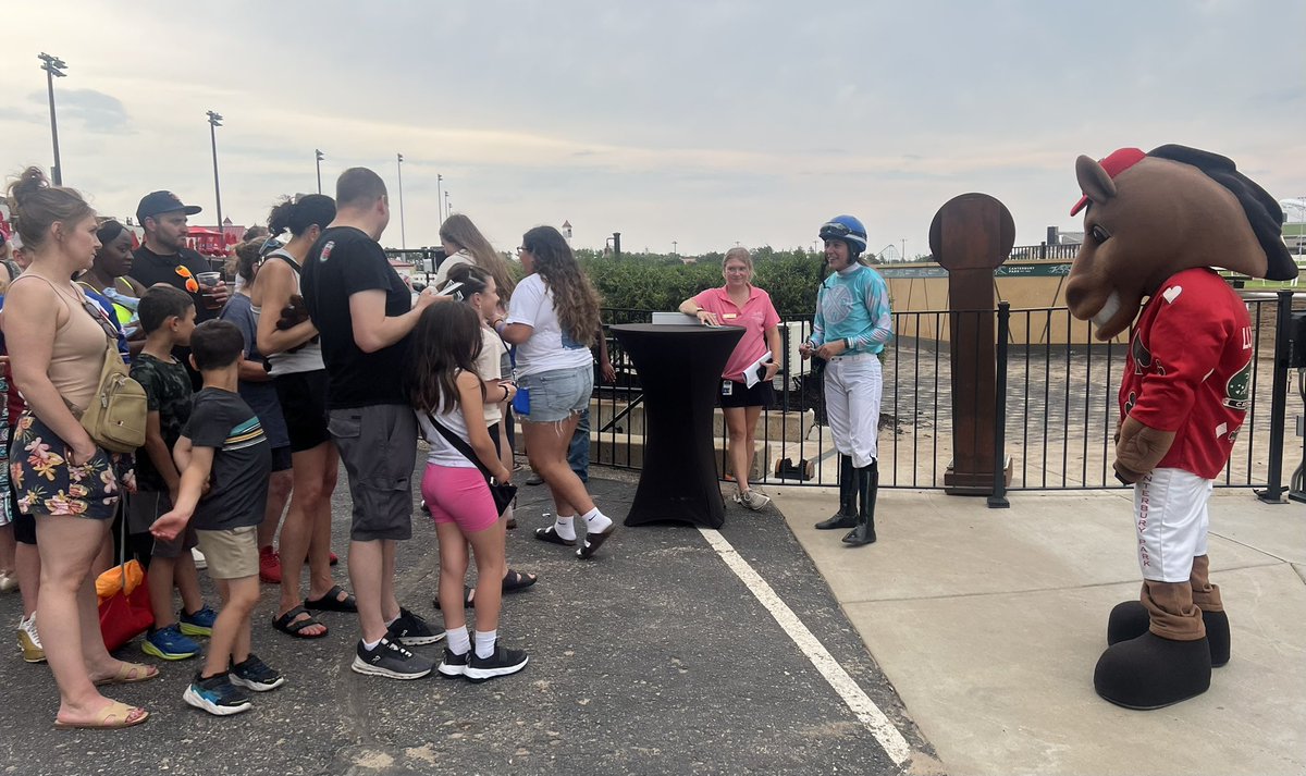 CBYTrackFlack's tweet photo. Jockey @HarrKelsi treated the kids @CanterburyPark to a meet and greet today signing her trading card and taking photos. This right after she rode Shankapotamus to victory at 20-1. https://t.co/cyJ8gjscgq