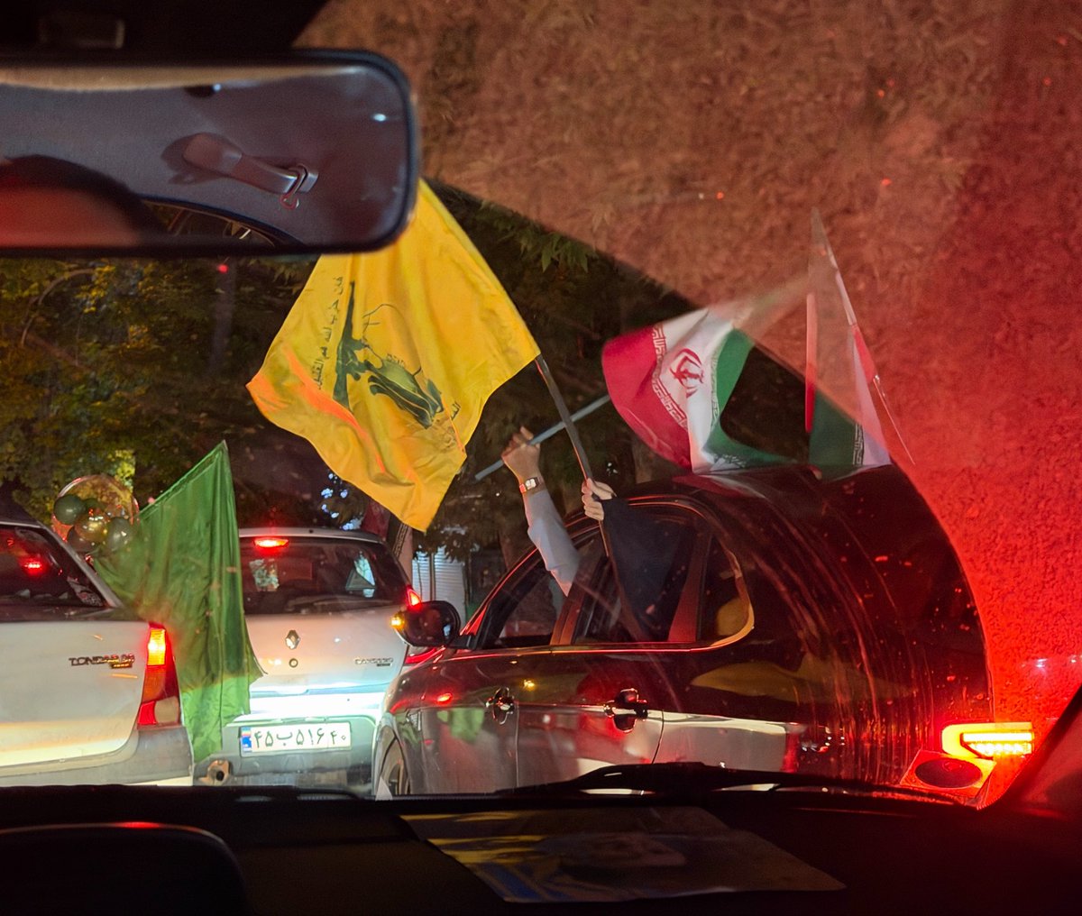 Helyeh_Doutaghi's tweet photo. Tonight is the result of two developments: the regional balance of force has shifted in a decisive manner, prompting Iran, for the first time ever, to carry military campaign in defence of its allies/ though it could also be framed as self-defense in response to continued violations of Iran territorial sovereignty over the past two days/ and or collective self defence re its regional allies.

Second, there has been a noticeable intensification of demands in response to escalating violence against Lebanon over the past week in the streets of Iran. Many carry Hezbollah flags and have been calling for action. In this, pressure emanating from the popular base of the revolution has significantly shaped the posture of the armed forces, particularly amid internal tensions among differing political factions, including reformist elements within Iran.

The pics taken over the past several nights.