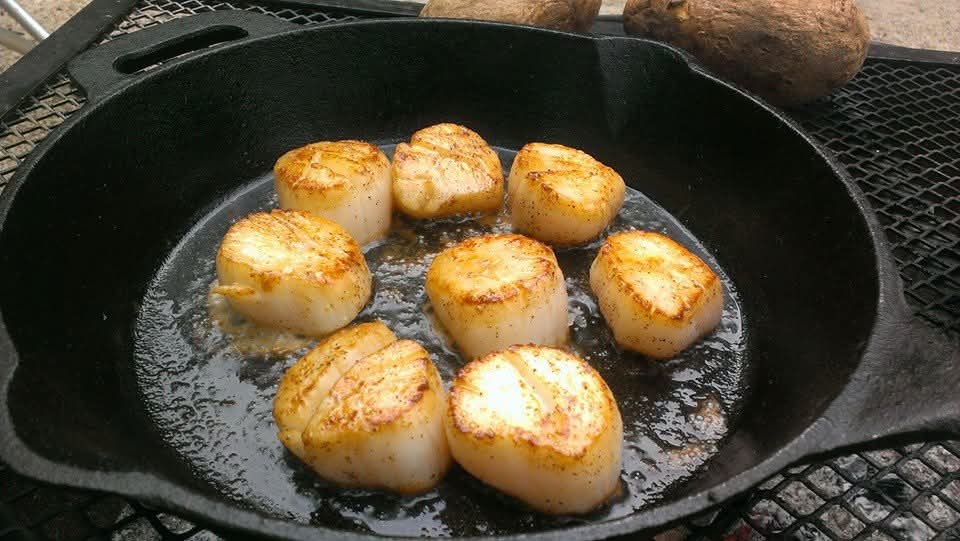 CampCookAlt's tweet photo. I was going through memories on FB and came across the Anniversary dinner I made for us when we went camping at Peninsula State Park in Door County Wisconsin. We ate well! Steaks
Baked Potatoes 
Pan Seared Scallops
Pan Fried Brussel Sprouts
Onion and Shrooms
All over a camp fire!
@BrandonDonkey2