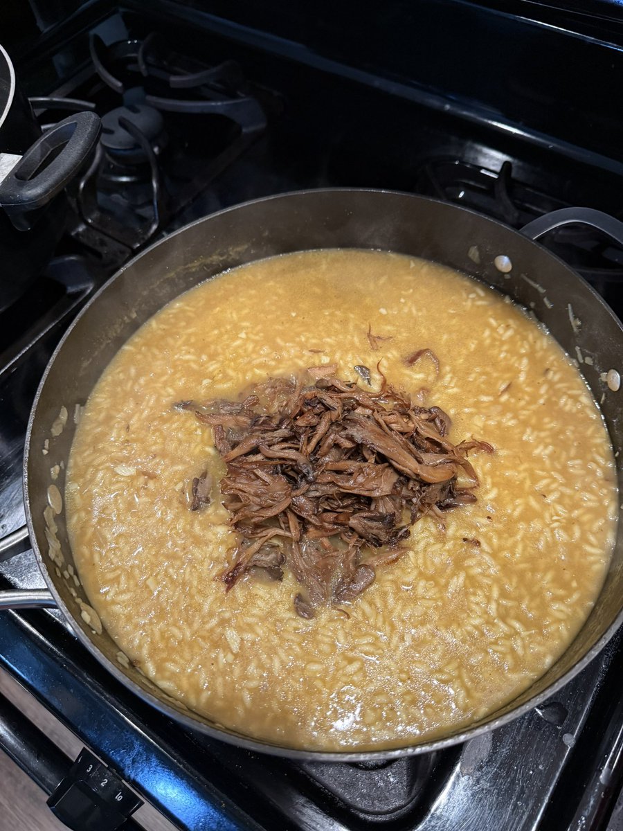 YTDalpha's tweet photo. First course this Sunday evening is some soy musrhoom arinchini. Risotto with curry powder, old bay, and shaoxing wine. Topped with an orange liquor reduction and soy mayo. Not sure if I'll make it to course #2. https://t.co/BnFlWL9n0V