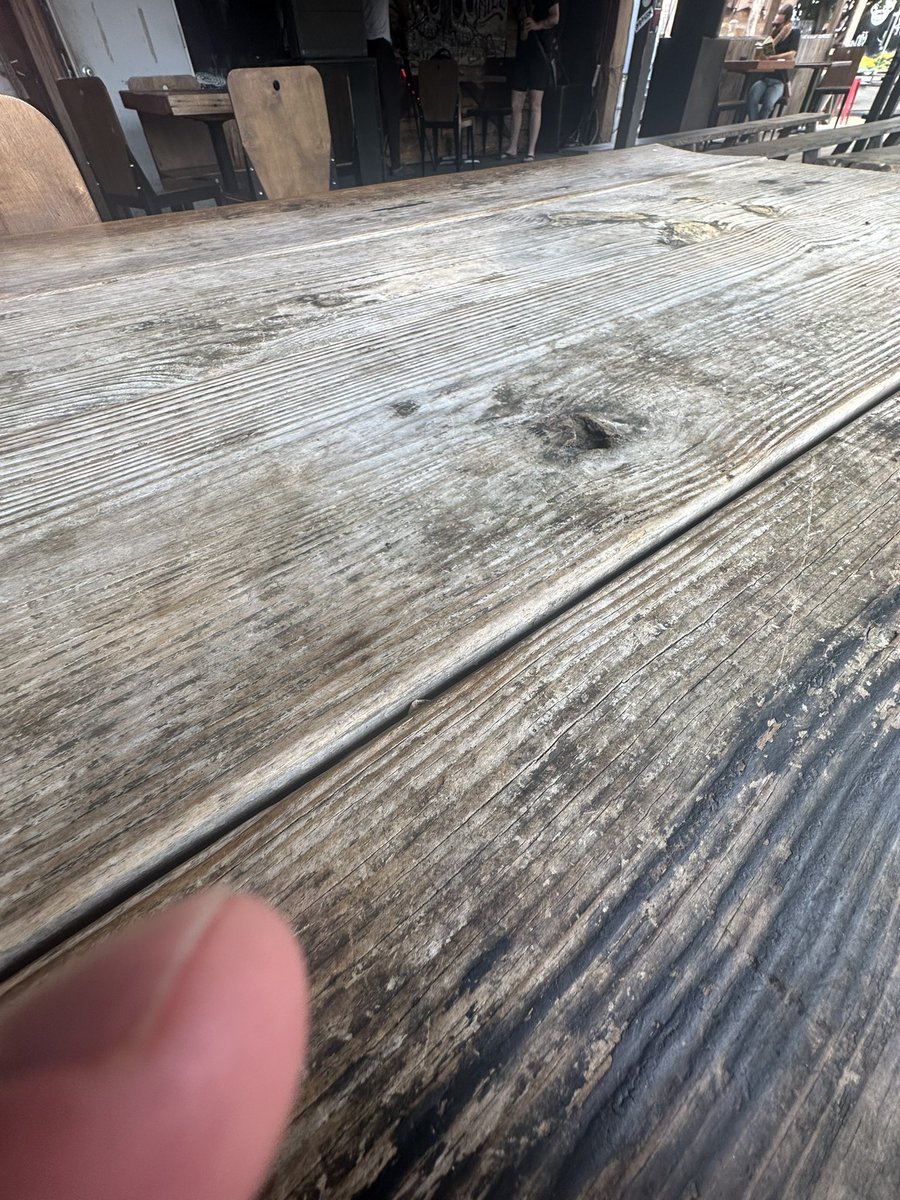 Shinercock's tweet photo. Outdoor patio of this coffee shop has a table in each corner. One has a woman with headphones in, smoking cigs and drinking PBR’s, while the other THREE now that I’m here have men reading. #staywinning #onourwayup https://t.co/pYcWCJ6QXV