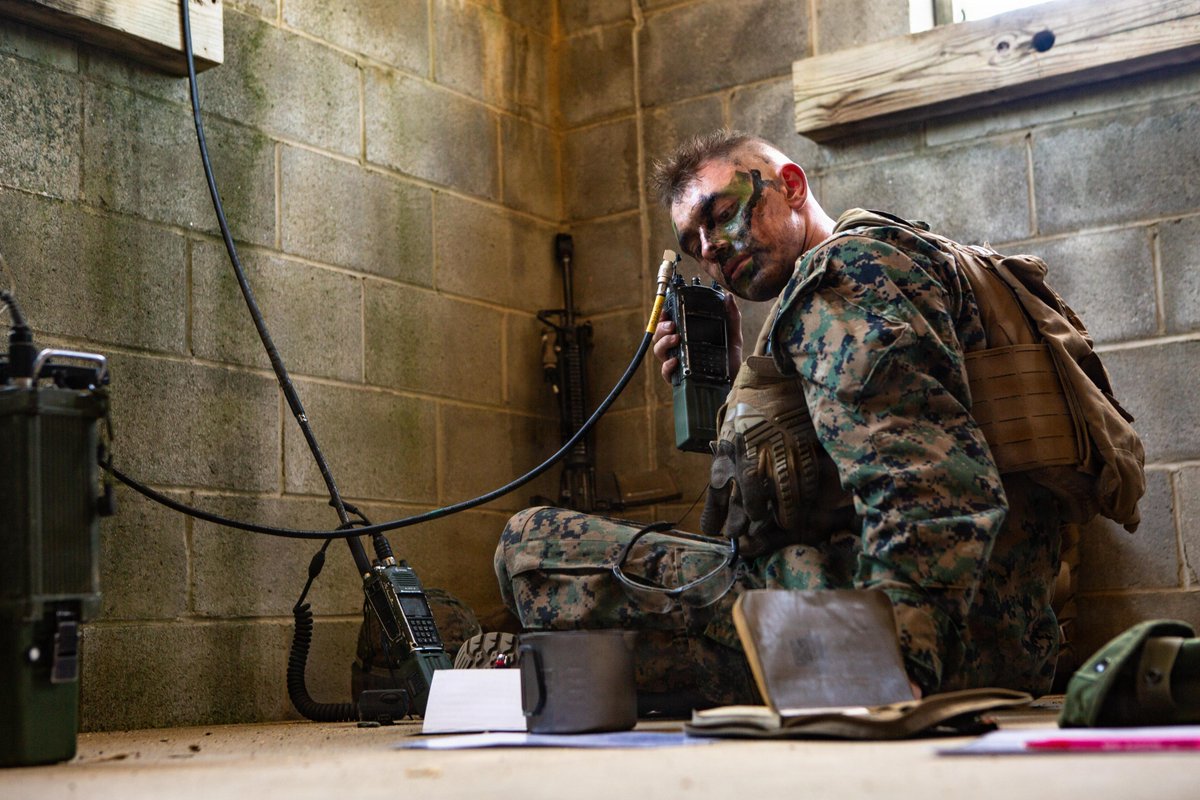 A U.S. Marine Corps student with Company B, The Basic School, Training Command, receives information about an upcoming resupply during the Warfighting Field Exercise at Marine Corps Base Quantico, Virginia, May 19, 2026. WARFEX serves as the culminating event at TBS, evaluating students\u2019 proficiency in decision-making, small-unit tactics, and leadership as they operate under sustained physical and mental pressure in a realistic warfighting scenario. (U.S. Marine Corps photo by Cpl. Anthony C. Ramsey Jr.)\n\n