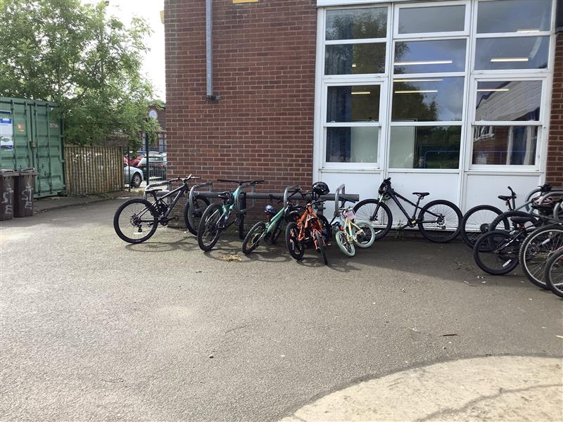 SantElfod's tweet photo. Great start to Healthy Living Week! 6 children joined  walk / bike and scoot to school. 56 bikes and scooters on site! Special guest Connor from @ColwynBayFC to kick off our week and present our sports personality of the year awards! @livingstreets @WWCTrustCymru https://t.co/zYlaDnJmwZ