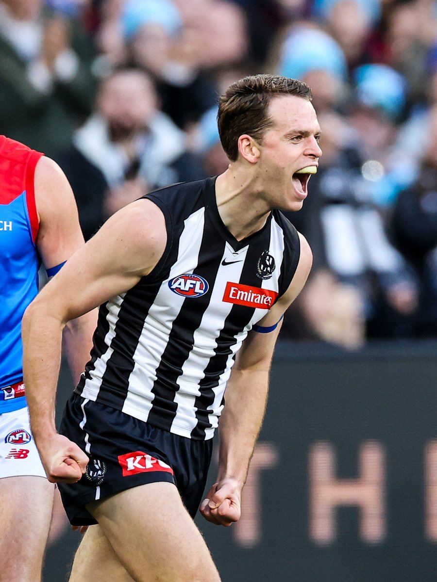 CollingwoodFC's tweet photo. Dream come true for Podiatrist Mitch Podhajski! 

At 27 years old, he kicks his first AFL goal in front of 90,000+ people at the MCG 👏 https://t.co/Sh9govdjPl