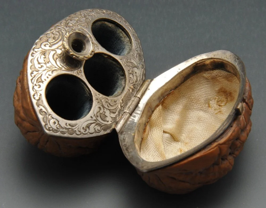 wikivictorian's tweet photo. Hinged walnut case with three scent bottles and a funnel, 19th century. France. In private collection. https://t.co/p4iOLRV71v