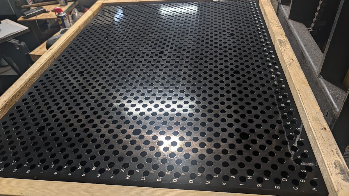 TosaTool's tweet photo. Caught this one going out today in shipping, half plate for a @MazakCorp VC300. Customer wanted half the table in a modular plate. 4140PH steel, Tosa hole pattern, Super Grind, Hot Black Oxide, and Alpha Numeric Engraving. Looks awesome! @Haas_Automation #cnc #modularfixturing https://t.co/vQBU3YYV5P