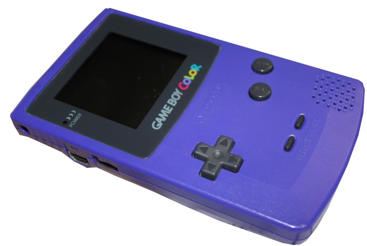 VideoGameHstry's tweet photo. When Nintendo made purple consoles https://t.co/uagVlrB9Ge