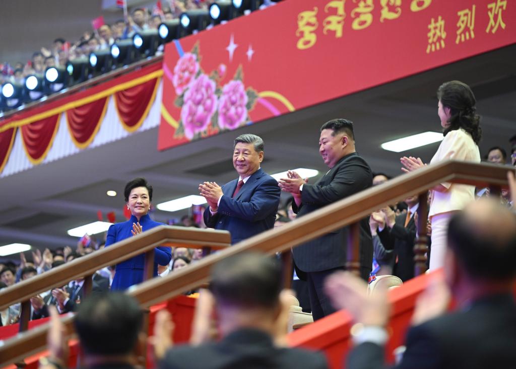PDChina's tweet photo. Xi Jinping, general secretary of the Communist Party of China Central Committee and Chinese president, and his wife Peng Liyuan, along with Kim Jong Un, general secretary of the Workers' Party of Korea and president of the State Affairs of the Democratic People's Republic of Korea (DPRK), and Kim's wife Ri Sol Ju, watch an artistic performance at the Pyongyang Gymnasium in Pyongyang, the DPRK, June 8, 2026.