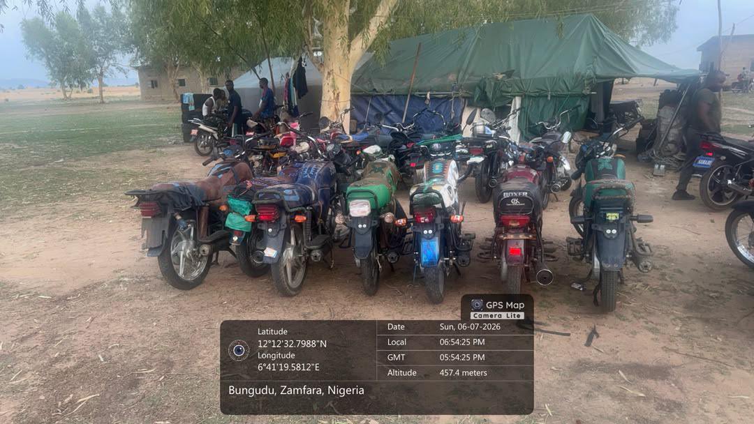 Pressman2040's tweet photo. TROOPS OF OPERATION FANSAN YAMMA NEUTRALIZE T£RR0R!ST, ARREST SUSPECTS AND DISRUPT CRIMINAL NETWORKS IN ZAMFARA STATE

Troops of Joint Task Force North West Operation FANSAN YAMMA have continued to record successes against t£rr0r!sts and b@nd!ts across Zamfara State. On 5 June 2026, troops of Sector 2 Operation FANSAN YAMMA on fighting patrol to Birnin Tsaba and Tsanu villages in Birnin Magaji Local Government Area made contact with terrorists at Birnin Tsaba village. Following a firefight, troops neutralized one t£rr0r!st and recovered seven motorcycles.

On 6 June 2026, troops responded to a t£rr0r!st attack at Anguwar Sarkin Musulmi village in Kaura Namoda Local Government Area. The troops engaged the t£rr0r!sts, forcing them to flee into the bush. Preliminary findings revealed that the t£rr0r!sts had stolen personal belongings from residents before the arrival of troops. The incident further highlights the growing desperation of t£rr0r!st elements whose sources of sustenance and logistics have continued to come under pressure from sustained military operations.

On the same day, troops responded to reports of an attack on commuters along the Kaura Namoda–Zurmi Road. Investigations showed that t£rr0r!sts ambushed two civilian vehicles between Jabanda and Dauran villages in Zurmi Local Government Area. Troops secured the area, evacuated injured victims for medical treatment and have continued efforts to track the t£rr0r!sts and rescue any abducted passengers.

Also on 6 June 2026, troops of Sector 2 Operation FANSAN YAMMA conducting a fighting patrol to Tudun Wada and Dan Gulbi communities in Maru Local Government Area arrested eight suspected bandits at Tudun Wada. Troops recovered seven motorcycles, communication equipment, mobile phones, power banks, military-style uniforms and other items. A structure used by the suspects was also destroyed.

In a related operation, troops on 5 June 2026 arrested the suspected recipient of recently intercepted ammunition at Tupa village in Shinkafi Local Government Area following intelligence exploitation. The suspect is in custody and assisting ongoing investigations. Operation FANSAN YAMMA remains committed to sustaining offensive operations against t£rr0r!sts and b@nd!ts and urges members of the public to continue providing timely and credible information to security agencies.