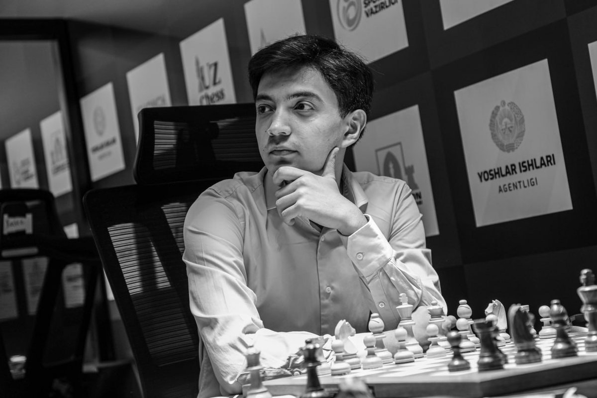 ChessbaseIndia's tweet photo. During the FIDE World Cup 2025 in Goa and the FIDE Candidates 2026, we saw a constant person near Javokhir Sindarov. When Sindarov lifted the trophy in both events, his friend and his second, Mukhiddin Madaminov, was there next to him. As Sindarov is not playing any major event, Madaminov decided to play at the Uzchess Cup Masters 2026, and what a guy, he defeated Nepo in 1st round and Nikolas Theodorou in 2nd. @UzchessCup  #uzchesscup