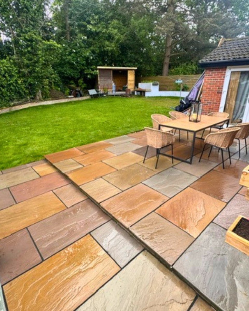 Nustone_UK's tweet photo. ✨ An incredible DIY transformation ✨

Some patios simply stop you in your tracks... and this is one of them 🤎🌿

Featuring the timeless beauty of Raj Green Sandstone, this enchanting outdoor space is full of natural charm, character, and warmth. Rich earthy tones blend effortlessly together, with subtle variations in colour and texture that have been shaped by nature over thousands of years.

From soft greens and warm buffs to hints of grey and brown, every slab tells its own story ✨

Why homeowners continue to fall in love with Raj Green:
🤎 Naturally beautiful and full of character
🤎 Hand-dressed edges for an authentic, organic finish
🤎 Riven surface helps retain grip underfoot
🤎 Frost-resistant and built for year-round enjoyment
🤎 Durable 22mm thickness

One of the most magical features of natural sandstone is how it changes with the weather 🌦️

After rainfall, the colours become deeper and more vibrant, revealing the stone's natural richness. In dry conditions, the tones soften to create a beautifully traditional look that suits almost any garden design.

Thinking of creating your own DIY masterpiece? 👏 Our handy paving installation guide is on hand to help support you every step of the way, from preparation through to the finishing touches.

It's no surprise Raj Green remains one of the UK's most loved paving choices 🤎

Create a garden filled with timeless charm and natural beauty ✨

https://t.co/bel0iwb7pr

#RajGreenSandstone #PatioInspiration #GardenTransformation #OutdoorLiving #Nustone
