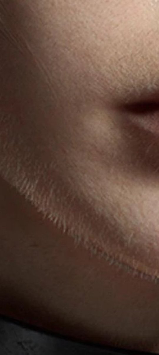 Pirat_Nation's tweet photo. A close-up image of Claire Redfield has gone viral after fans noticed an unusual level of realism in her face. 

Instead of the perfectly smooth skin the image reveals subtle pores, realistic skin texture, and even fine peach fuzz across her cheeks and jawline. https://t.co/Ztxi780AHB
