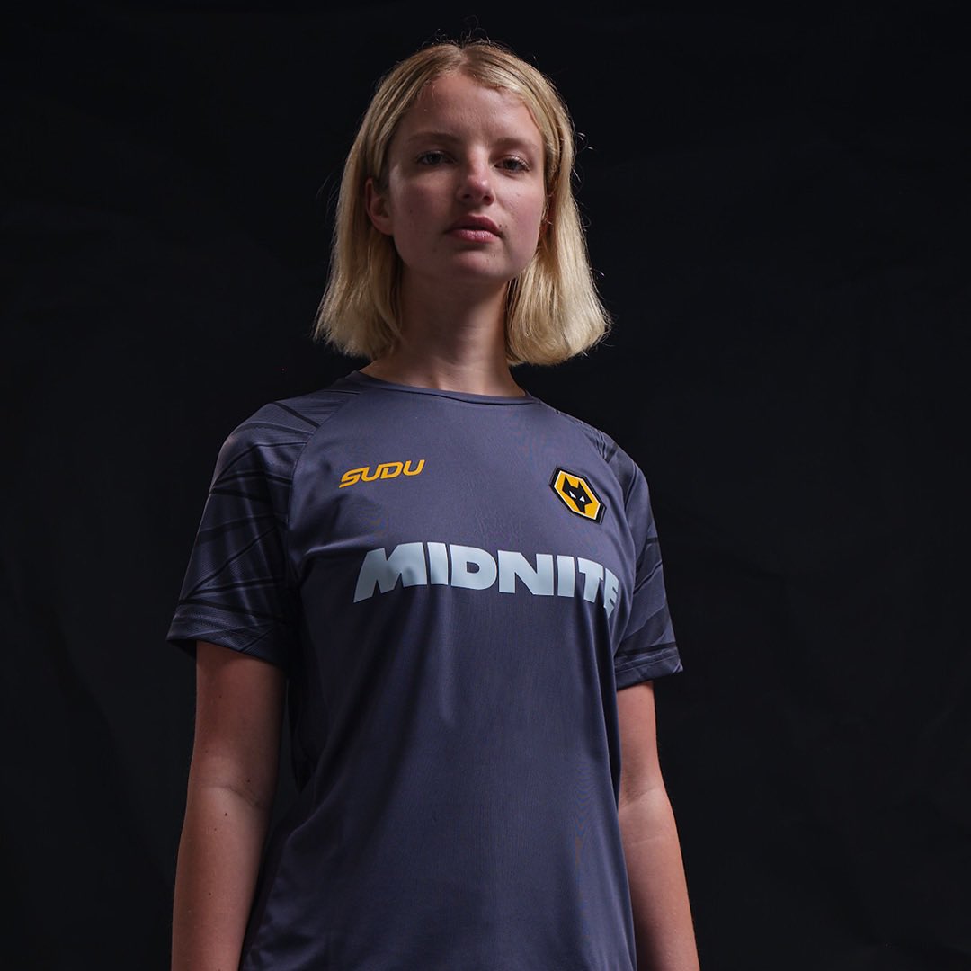 Wolves's tweet photo. The technical area just got an upgrade.

The 2026/27 Coaches Training Collection is here - Charcoal Blue, Old Gold accents, and performance-first construction from the training ground to matchday. 

Pre-Order Available Now https://t.co/z4vw17UPWK