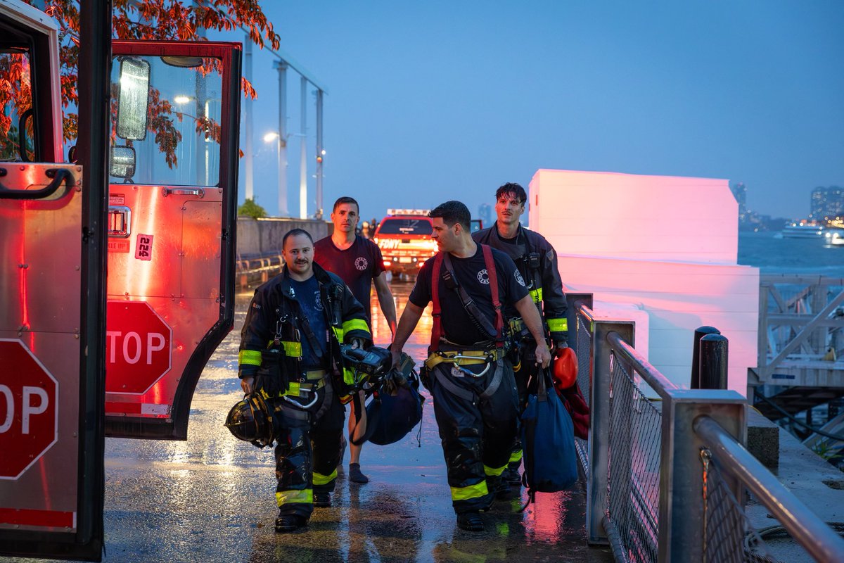 FDNY's tweet photo. As severe weather moved through New York City Saturday evening, FDNY members responded to multiple storm-related emergencies across the city.

At approximately 7:46 p.m., units responded to reports of debris falling from scaffolding near Pier 6 in Brooklyn Bridge Park. While operating at the scene, members were alerted to a person in the water nearby. FDNY Engine 224 quickly relocated to the waterfront, where members lowered a firefighter into the water and deployed portable ladders to assist with the rescue.

Working together, members safely removed the individual from the water and also assisted a second civilian who had entered the water in an effort to help the victim.

The FDNY commends the quick actions and teamwork of the members operating and reminds New Yorkers to remain alert during severe weather emergencies.