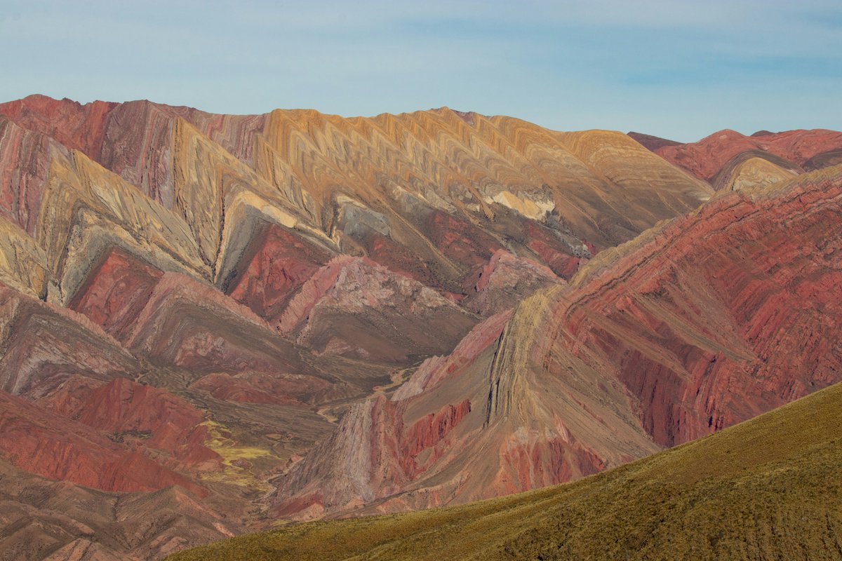 ARGunlocked's tweet photo. Today's Argentine Landscape: The Hornocal Range in Jujuy, also known as the Mountain of 14 Colors. Rising above 4,300 meters (over 14,000 feet), its multicolored layers were formed by millions of years of geological activity in the Andes. https://t.co/Pvax3T9cEH