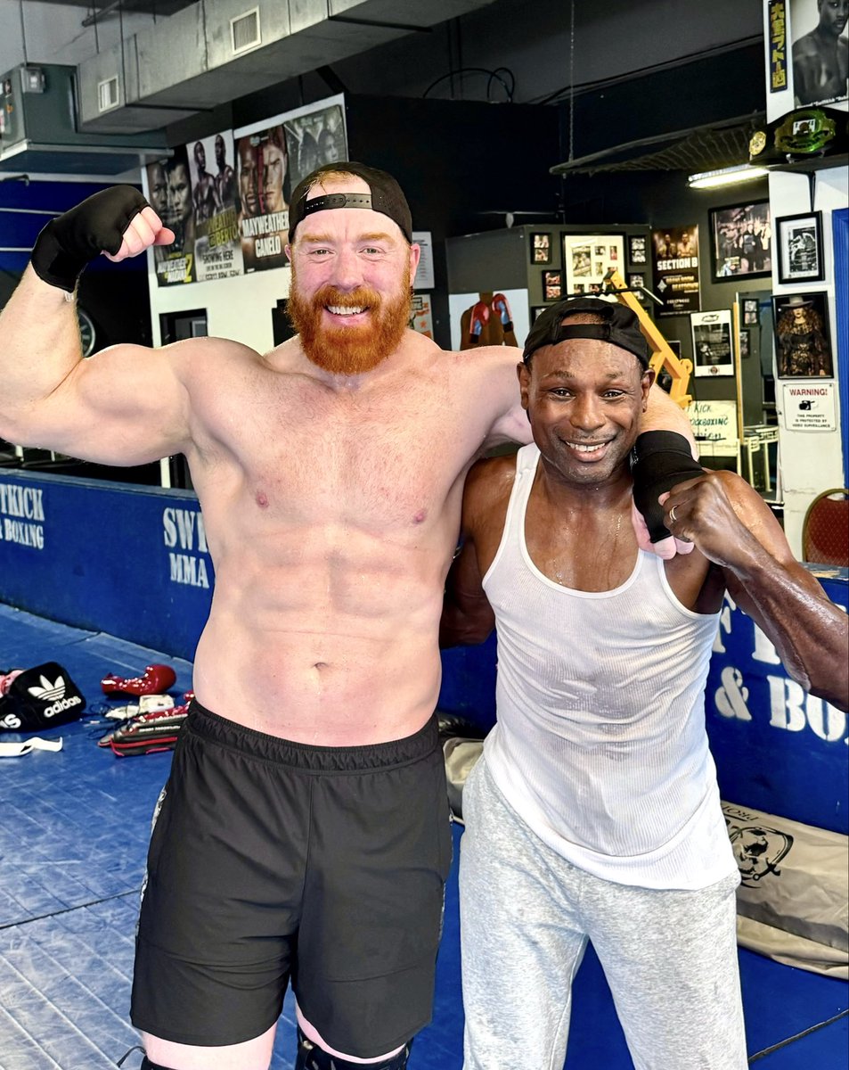 WWESheamus's tweet photo. anyone sleeping on Sheamus’ return to the squared circle hasn’t mixed-it-up with BERNARD “SWIFTKICK” ROBINSON aka coach 

Champions train Champions 👊🏻👊🏻 https://t.co/MRQXa3LHPh