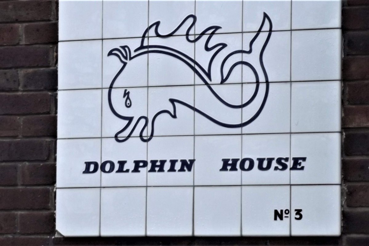 Joseamey's tweet photo. This jolly dolphin adorned an office building in Market Close, Poole. The building is now being converted and I can't find out if the panel has been saved. Not a good sign.... #TilesonTuesday #Poole #Dorset https://t.co/yaxNUCNppR