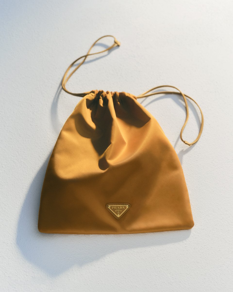 Prada's tweet photo. Prada Days of Summer Accessories broaden the dialogue between functionality and lightness. 
Discover more: https://t.co/SOLFQlci8d

#PradaSummer #Prada https://t.co/H4jT22zR4f