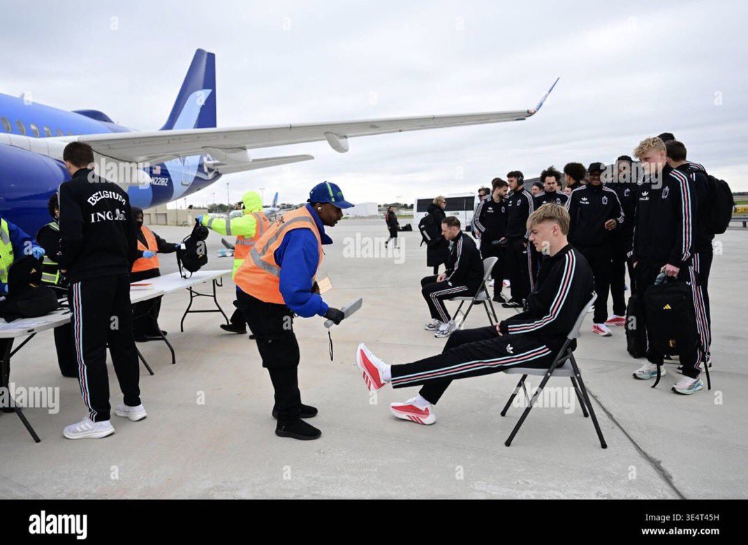 Andy6Dai's tweet photo. @JBT_86 the Belgian national soccer team, the "Red Devils," undergoing tarmac security checks at Atlanta airport before flying to Chicago for a 2026 World Cup preparation match.The team was allowed to skip terminal queues and drive directly to their chartered Brussels Airlines aircraft. https://t.co/gUwh57tTna