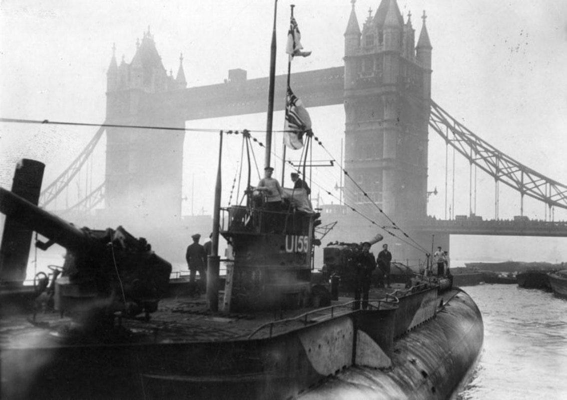 Lost___London's tweet photo. Captured German u-boat U-155 exhibited near Tower Bridge in London, after the 1918 Armistice. https://t.co/UBeqxG4DLo