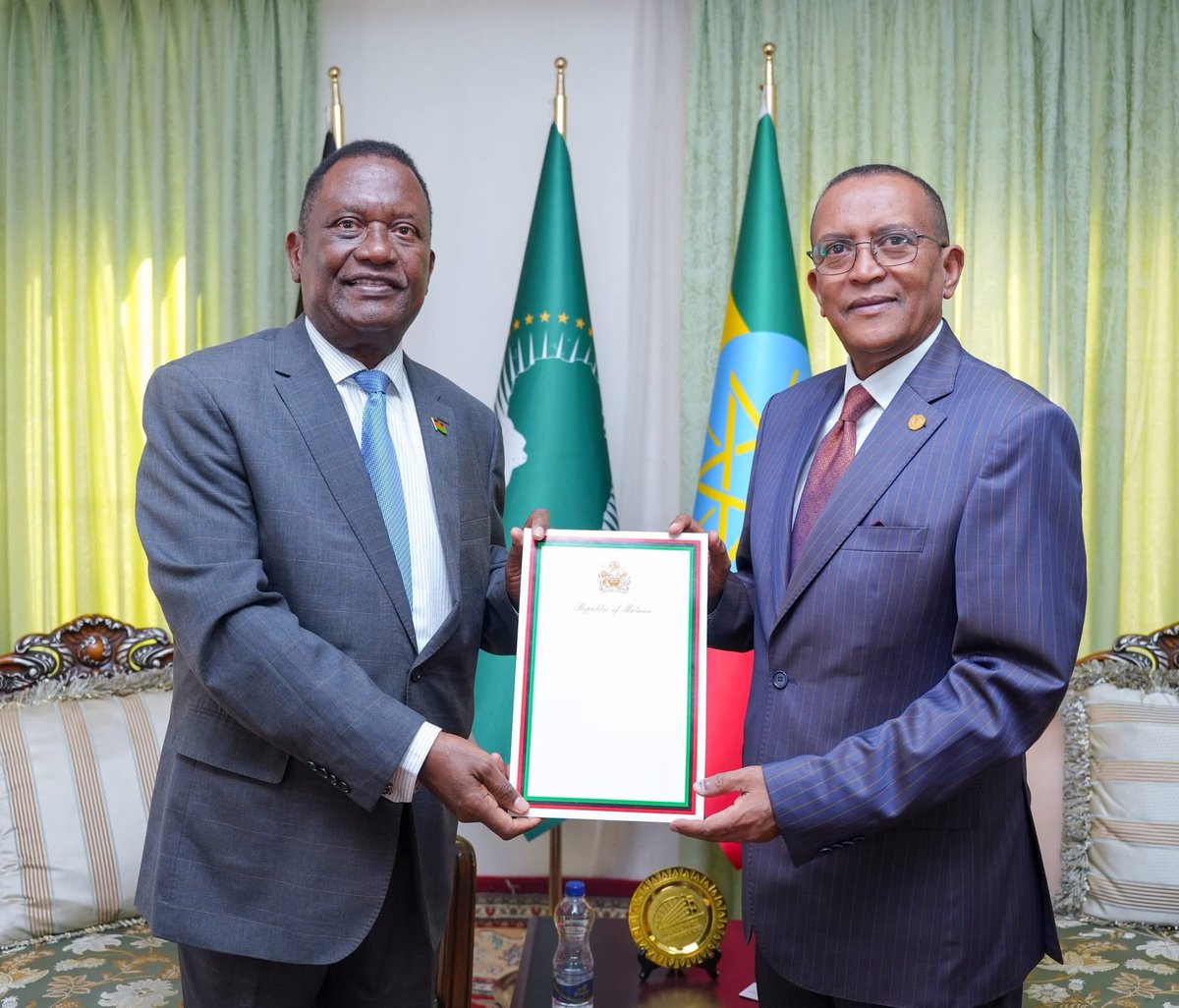MFAEthiopia's tweet photo. Chief of State Protocol at the Ministry of Foreign Affairs of the Federal Democratic Republic of Ethiopia, Melaku Bedada, today received copies of the Letters of Credence of the newly appointed Ambassador-Designates of the Republic of Malawi, the Republic of Ghana, and the Oriental Republic of Uruguay, Khwauli B. Msiska, McARIOS Akanbeanab Akanbong, and Mario Ángel Silva Castro, respectively.